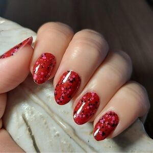 Color Street | Head Over Claws - fiery crimson red, black/pink flecks,